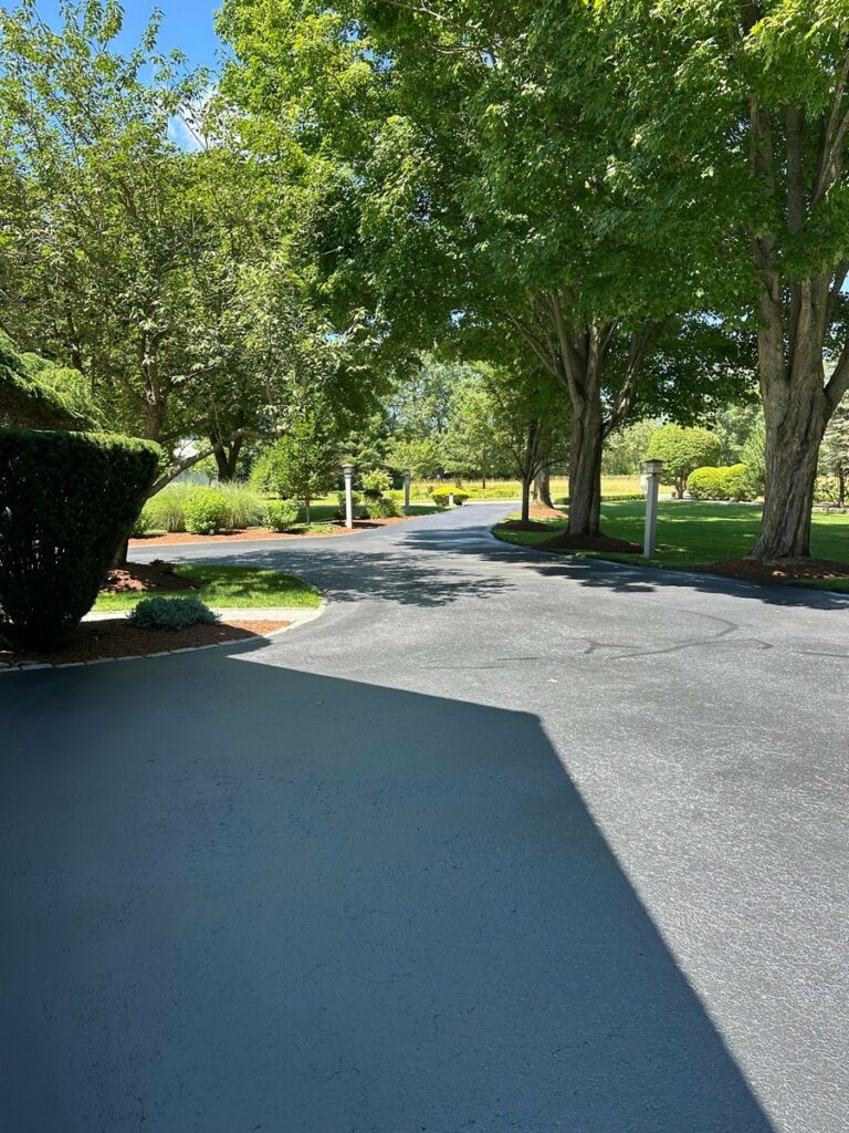 Long Driveway Sealcoating and Asphalt Crack Filling in Littleton, Massachusetts